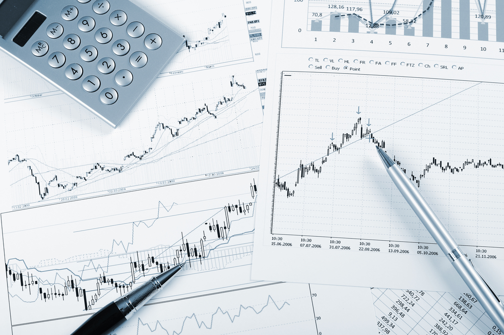 charts and graphs of sales of securities - workplace successful business man-1